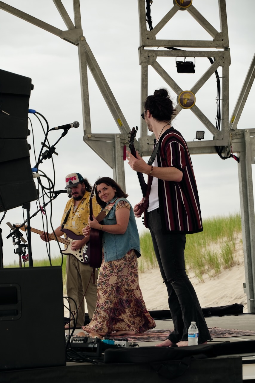 Band performing on the beach